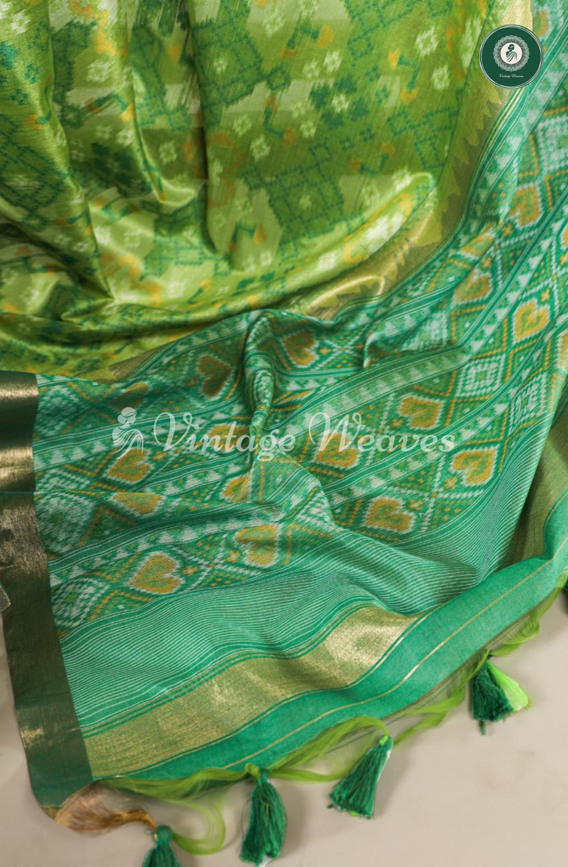 Soft Khadi Raw Silk Saree with Patola Pallu & Ikkat Weaving - Green